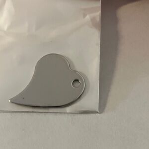 4 New Stainelss Steel Heart-Shaped Pendants with stainless steel connectors.